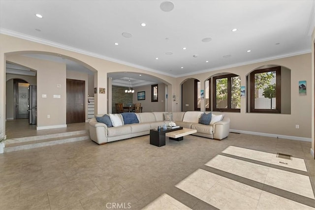 living area featuring baseboards, crown molding, and recessed lighting