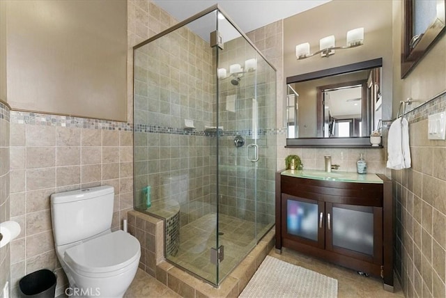 31422 Ceanothus Dr, Laguna Beach, CA 92651 - full bathroom featuring tile walls, tile patterned flooring, vanity, and a shower stall