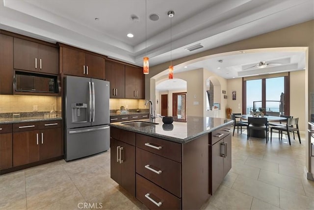 31422 Ceanothus Dr, Laguna Beach, CA 92651 - kitchen featuring stainless steel fridge with ice dispenser, black microwave, a raised ceiling, a ceiling fan, and tasteful backsplash