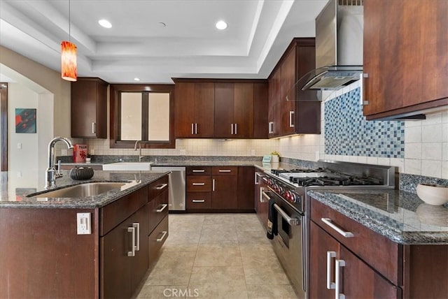 31422 Ceanothus Dr, Laguna Beach, CA 92651 - kitchen with appliances with stainless steel finishes, wall chimney range hood, a raised ceiling, backsplash, and decorative light fixtures