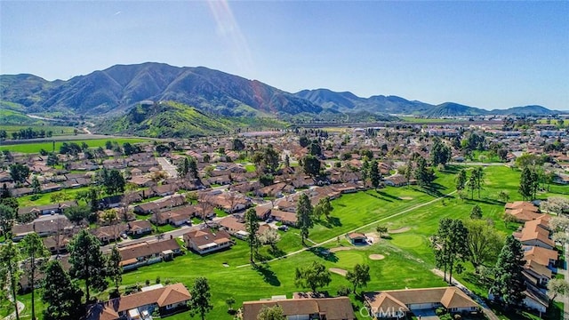 birds eye view of property with a residential view and a mountain view