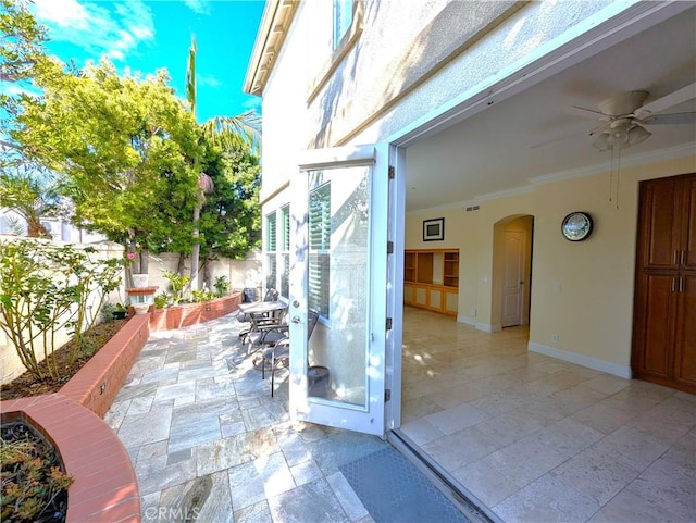 view of patio / terrace with a fenced backyard and ceiling fan