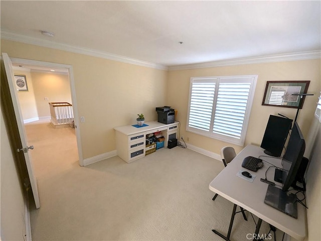 home office featuring baseboards, ornamental molding, and light colored carpet