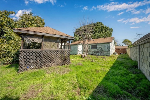 view of yard featuring fence