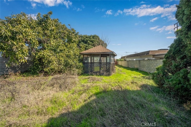 view of yard with fence