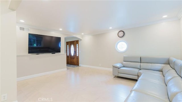 unfurnished living room with arched walkways, recessed lighting, visible vents, baseboards, and crown molding