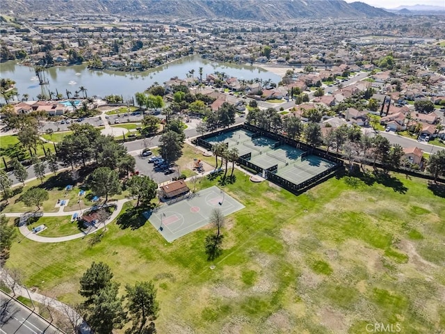 bird's eye view with a residential view and a water and mountain view