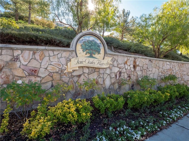 view of community sign