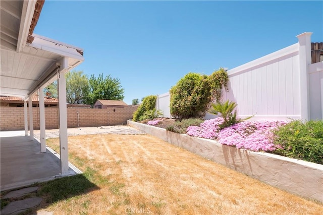 17875 Idyllwild Ln, Victorville, CA 92395 - fenced backyard featuring a patio area