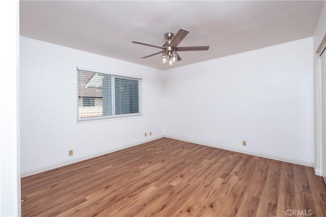 17875 Idyllwild Ln, Victorville, CA 92395 - empty room featuring light wood-style floors, a ceiling fan, and baseboards