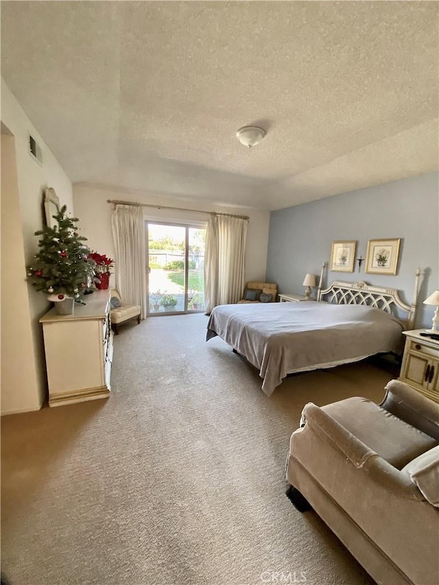 bedroom with visible vents, light colored carpet, access to exterior, vaulted ceiling, and a textured ceiling