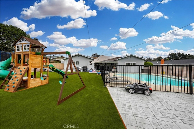 view of playground with a fenced in pool, a patio area, fence, and a lawn