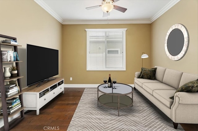 living area featuring dark wood-type flooring, ornamental molding, baseboards, and ceiling fan