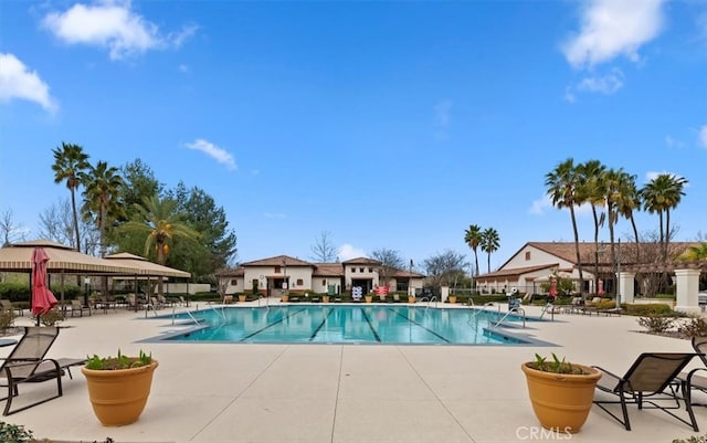 pool with a patio