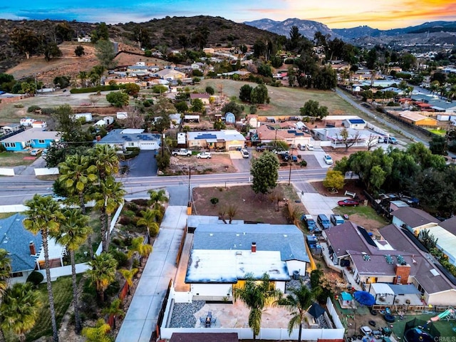 aerial view at dusk with a residential view