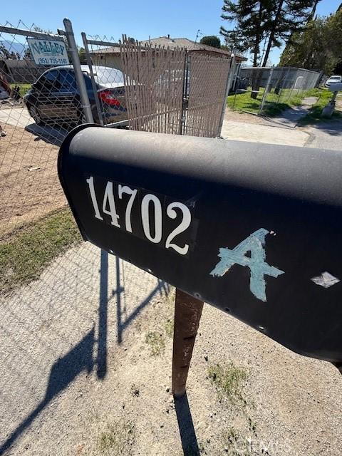 exterior details featuring fence