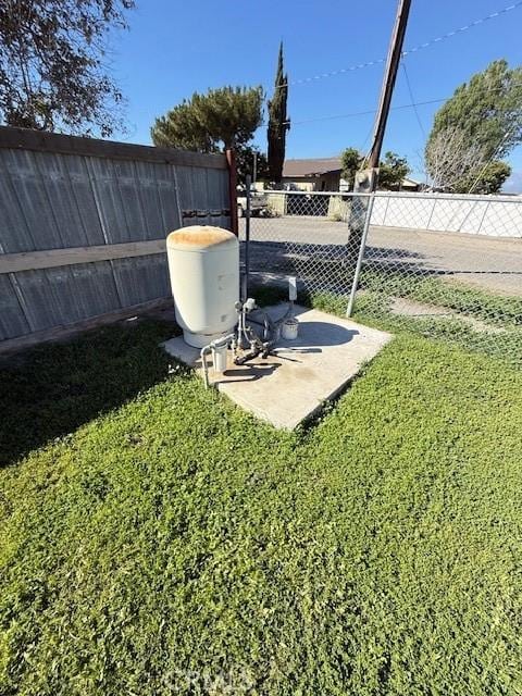 view of yard with a patio area and fence