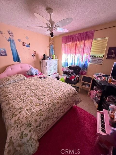 carpeted bedroom featuring a ceiling fan, cooling unit, and a textured ceiling