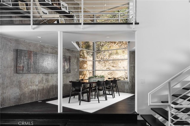 dining space featuring wood finished floors