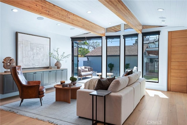 interior space with beamed ceiling, recessed lighting, and light wood-style floors