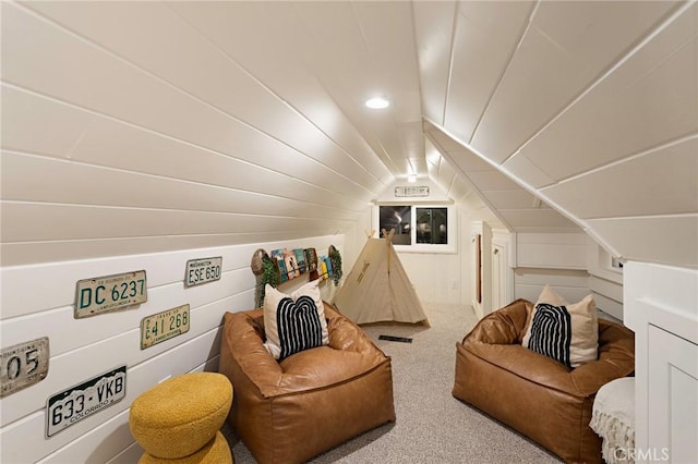 bonus room featuring lofted ceiling and carpet