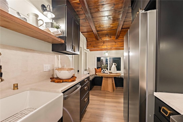 kitchen with dishwasher, wooden ceiling, beamed ceiling, light countertops, and open shelves