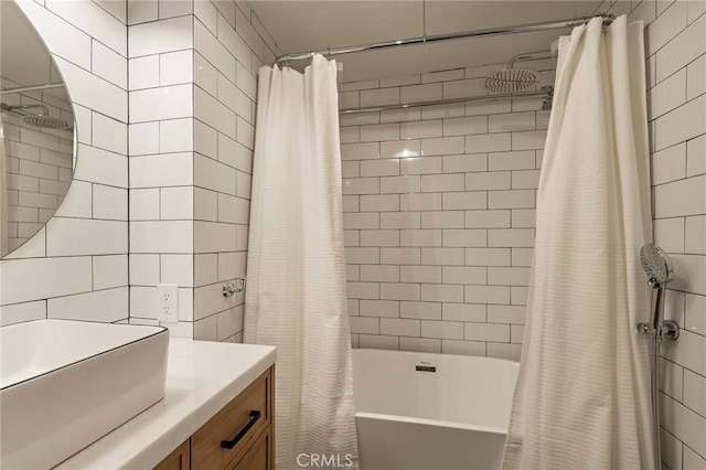 full bathroom featuring shower / tub combo with curtain and vanity