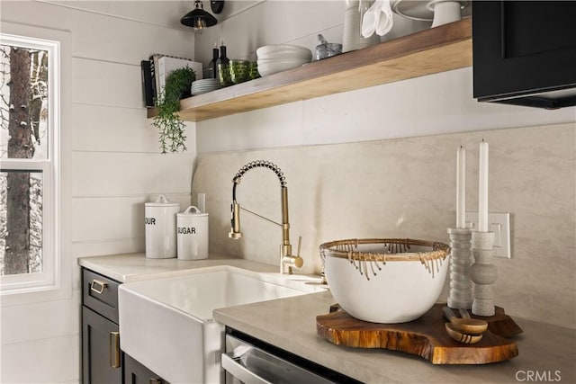 1149 Scenic Way, Rimforest, CA 92378 - kitchen view of a sink, light countertops, open shelves, and stainless steel dishwasher