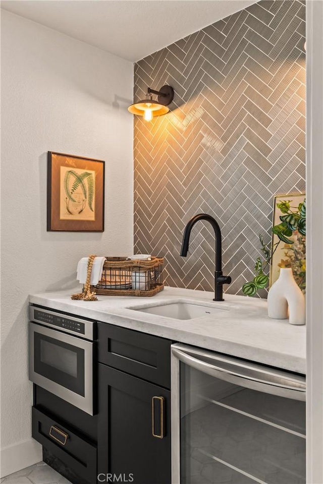 1149 Scenic Way, Rimforest, CA 92378 - kitchen with wall oven, light countertops, a sink, and wine cooler