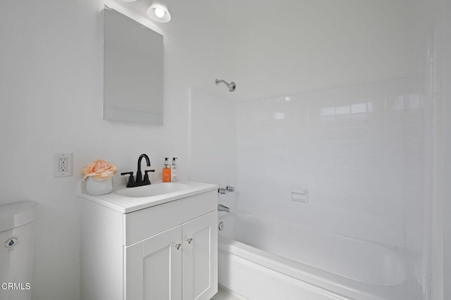 full bath featuring vanity, toilet, and shower / bathtub combination