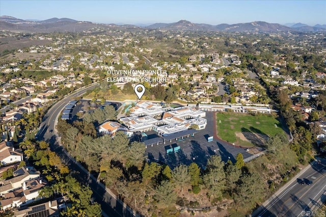 bird's eye view with a residential view and a mountain view