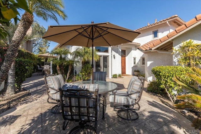 view of patio with outdoor dining space