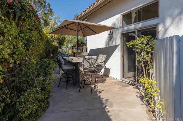 view of patio with fence