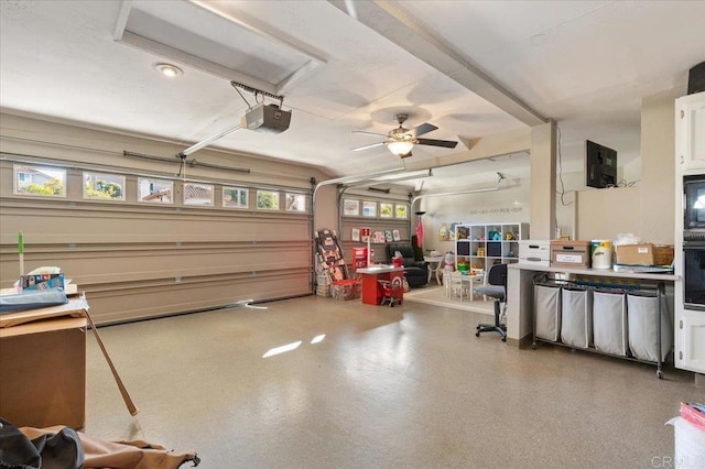 garage featuring a garage door opener