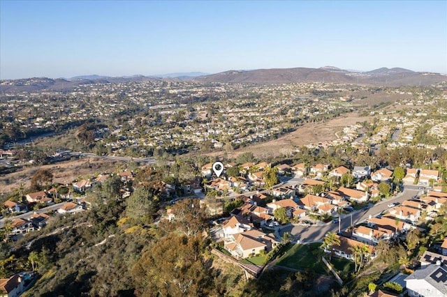 bird's eye view with a residential view and a mountain view