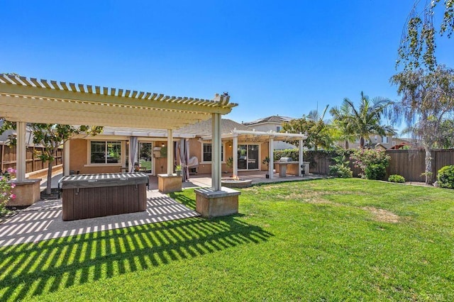 view of yard with a pergola, a patio area, a fenced backyard, and a hot tub