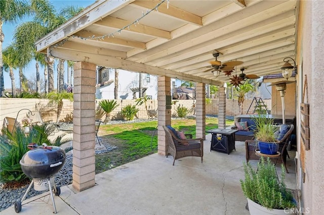 view of patio / terrace with a grill, a ceiling fan, an outdoor living space, and a fenced backyard