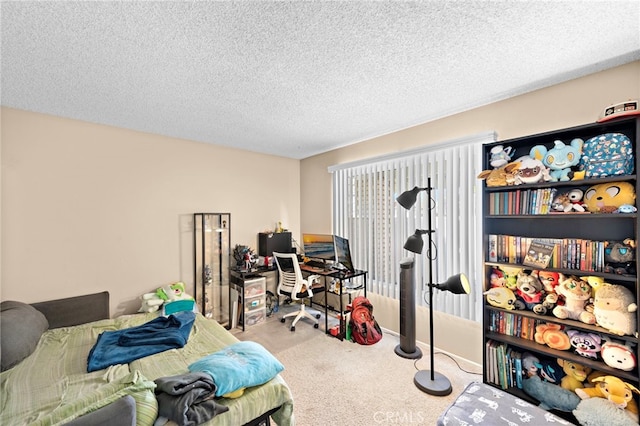 carpeted bedroom with a textured ceiling