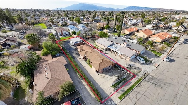 aerial view featuring a residential view and a mountain view