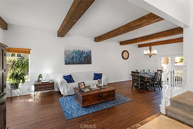 living area with stairway, beam ceiling, a chandelier, and wood finished floors