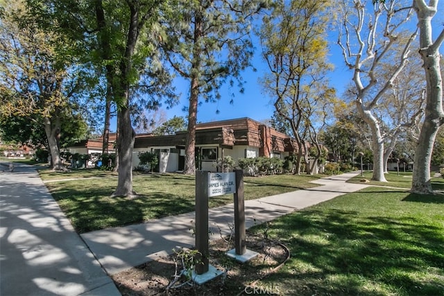 exterior space featuring a yard