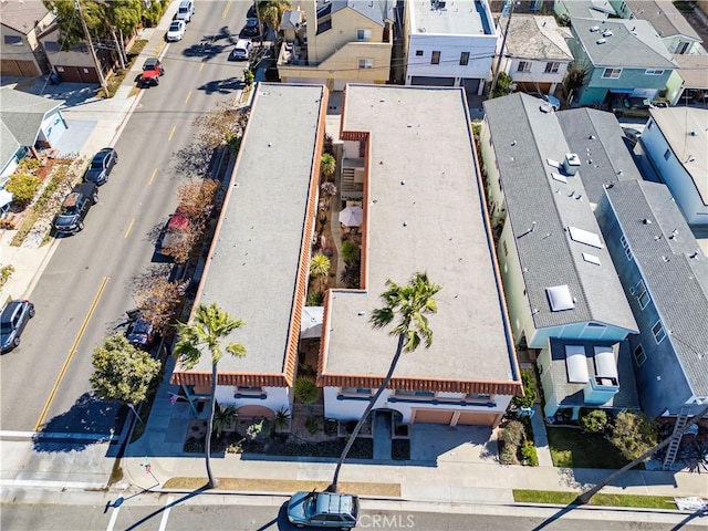 birds eye view of property with a residential view