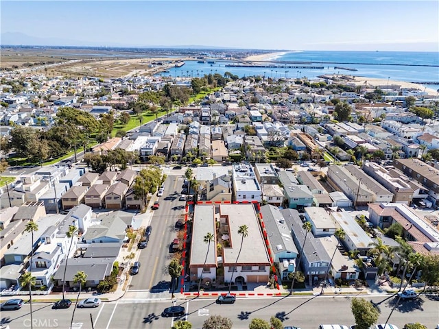 bird's eye view featuring a water view and a residential view