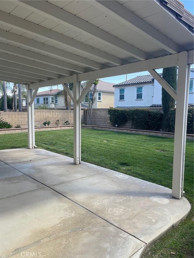 view of patio / terrace featuring fence