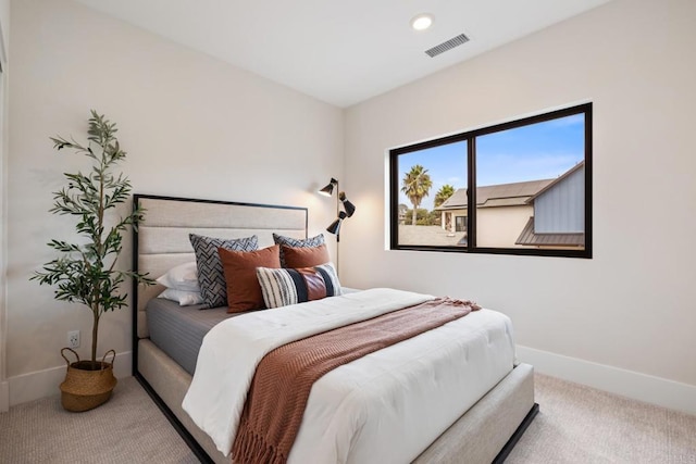 bedroom with carpet floors, baseboards, visible vents, and recessed lighting