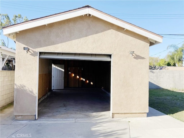 detached garage with fence