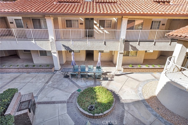 surrounding community with a patio area