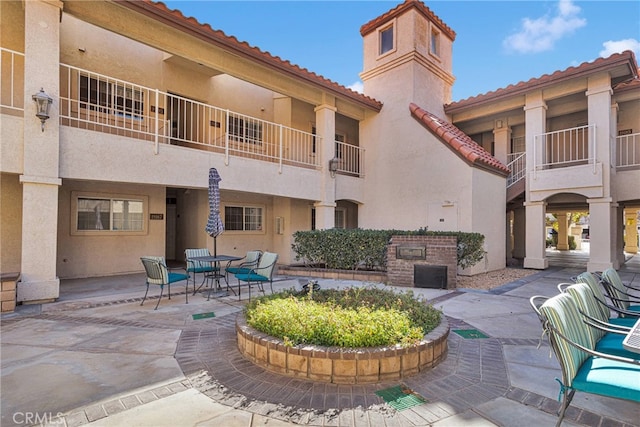 view of community with a patio