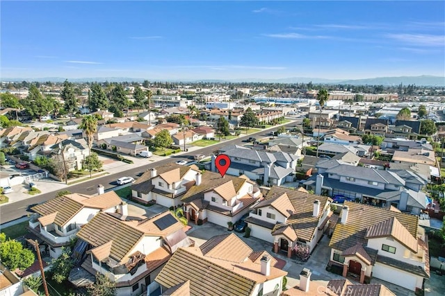 bird's eye view featuring a residential view and a mountain view