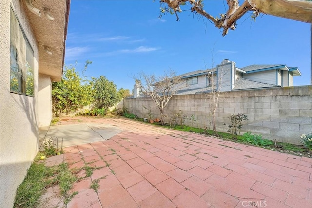 view of patio with a fenced backyard